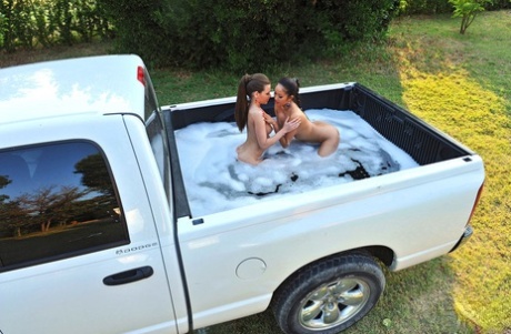 Nude females Subil Arch & Danika have lesbian sex in box of pickup truck